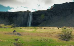 Cliff With a Waterfall in Iceland - Fun - VIDEOTIME.COM