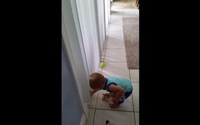 Toddler Struggles To Pick Up Balls