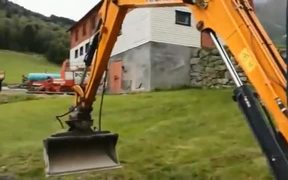 Three-Year-Old Operating A Real Excavator
