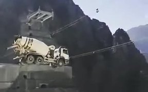 Truck Being Carried Over By Rescue Team