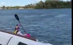 Kayaking On The Waves Generated By A Motorboat - Sports - VIDEOTIME.COM
