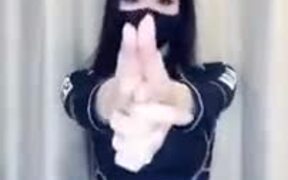 Here's A Ninja Woman Doing Tricks With Her Hands
