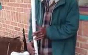 Man Playing Water Pipe Saxophone - Fun - VIDEOTIME.COM