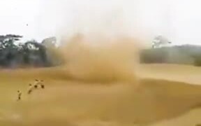 Indonesian Students Chasing A Sand Storm - Fun - VIDEOTIME.COM