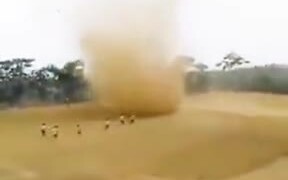 Indonesian Students Chasing A Sand Storm