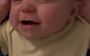 Baby Crying For A Head-Scratcher Pleasure