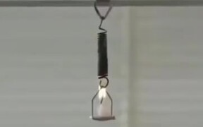Cool Physics Experiment With A Candle And A Spring - Tech - VIDEOTIME.COM