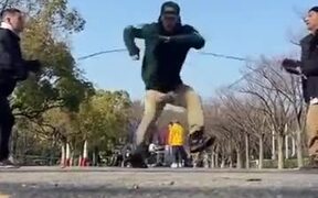 Japanese Man Dances Fast Over Skipping Rope