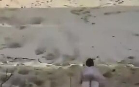 Man Dune Surfs His Way Into The Sea