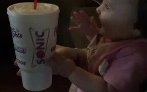Adorable Baby Loves Sound of Ice Shaking in Cup