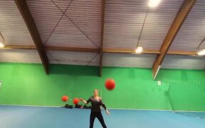 Duo Does Horizontal Juggling With Multiple Balls