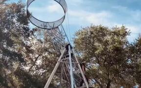 Circus Performer Casually Walks on Wheel of Death
