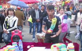 Street Performer Shows Off Slinky Skills