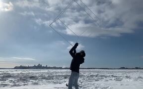 Guy Juggling With Giant Hollow Cube