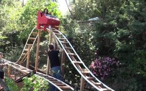 Girl Rides New Backyard Roller Coaster