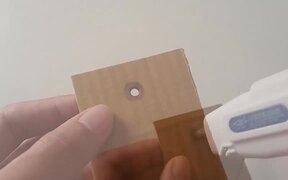 Person Makes Pencil Sharpner Box Out Of Cardboard - Tech - VIDEOTIME.COM