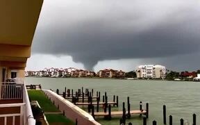 Huge Tornado Moves Across Town During Storm - Fun - VIDEOTIME.COM