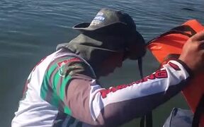 Men in Boat Rescue Monkey with Life Jacket - Animals - VIDEOTIME.COM