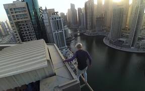 Man Performs Some High-Rise Stunts - Fun - VIDEOTIME.COM