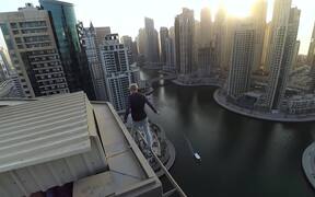 Man Performs Some High-Rise Stunts - Fun - VIDEOTIME.COM