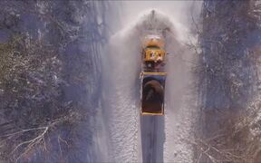 Snowplow Clears Deep Heavy Snow After Storm