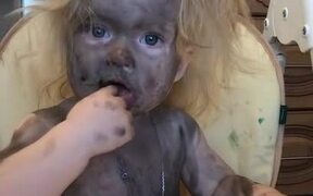 Child Covered in Paint