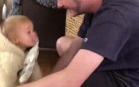 Toddler Tries for Hug but Face Plants Instead