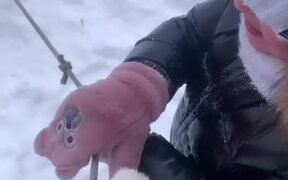 Pup Takes Little Tyke Down Snowy Slope