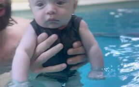 An Infant Learning To Stay Afloat - Kids - VIDEOTIME.COM