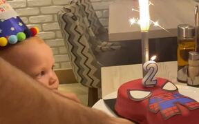 Toddler On The Verge Of Crying At His Birthday