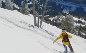 Guy Jumps Off Cliff & Opens Parachute While Skiing