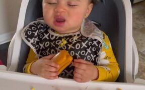 Toddler Struggles to Stay Awake While Eating Food