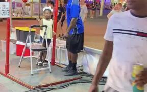 Kid Wins Monkey Bar Game At State Fair