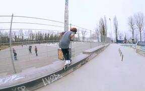 Guys Perform Freestyle Scootering On Ramp