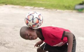 Boy Performs Cool Freestyle Football Tricks - Kids - VIDEOTIME.COM