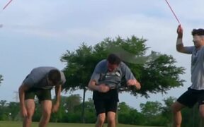 Friends Perform Tricks While Doing Double Dutch - Sports - VIDEOTIME.COM