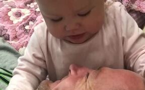 Baby Playfully Attempts to Put Pacifier - Kids - VIDEOTIME.COM