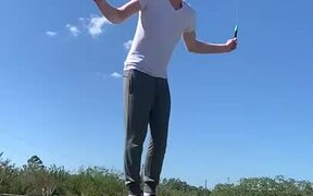 Guy Jumps Rope While Skipping on Teeterboard - Fun - VIDEOTIME.COM