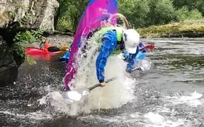 Kayaker Dives Into River & Springs Right Back Out
