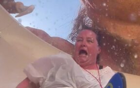 Mom Feels Panicky While Rding The Water Slide
