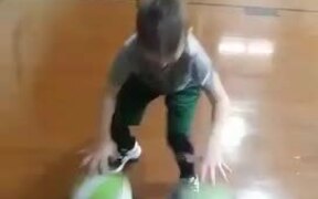 Kid Dribbles Two Balls Simultaneously - Kids - VIDEOTIME.COM
