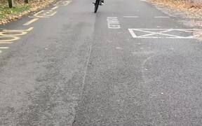 Cyclist Attempting To Wheelie Faces Hilarious Fail - Sports - VIDEOTIME.COM
