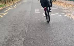 Cyclist Attempting To Wheelie Faces Hilarious Fail - Sports - VIDEOTIME.COM