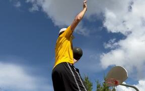 Man Shoots Multiple Hoops While Balancing - Fun - VIDEOTIME.COM
