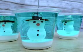 Person Creatively Makes Snowman Jelly Cups - Fun - VIDEOTIME.COM