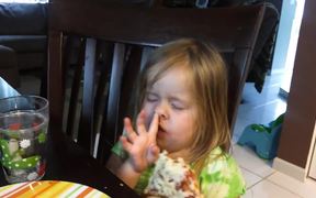 Little Girl Falls Asleep Eating Pizza