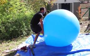 Slow Mo Guys Popping Huge Balloon