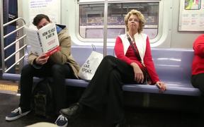 Fake Book Covers On The Subway