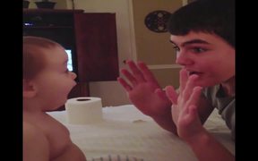 Baby Amazed By Magic Trick