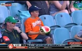 Kid Eating A Whole Watermelon